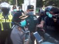 Polres Tanjung Perak Bersama Tiga Pilar Semprotkan Disinfektan