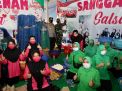 Persit Kartika Chandra dan Relawan Bersinergi Bantu Korban Longsor 