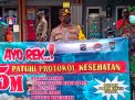 Kaposek Asemrowo Bagikan Masker Gratis kepada Pengguna Jalan