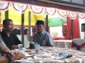 Kapten Inf I Made Sudiadnyana Menjalin Komunikasi Sosial  Dengan Warga