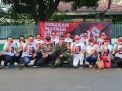 Gerakan Masker Merah Putih Bagikan Masker di Bunderan HI